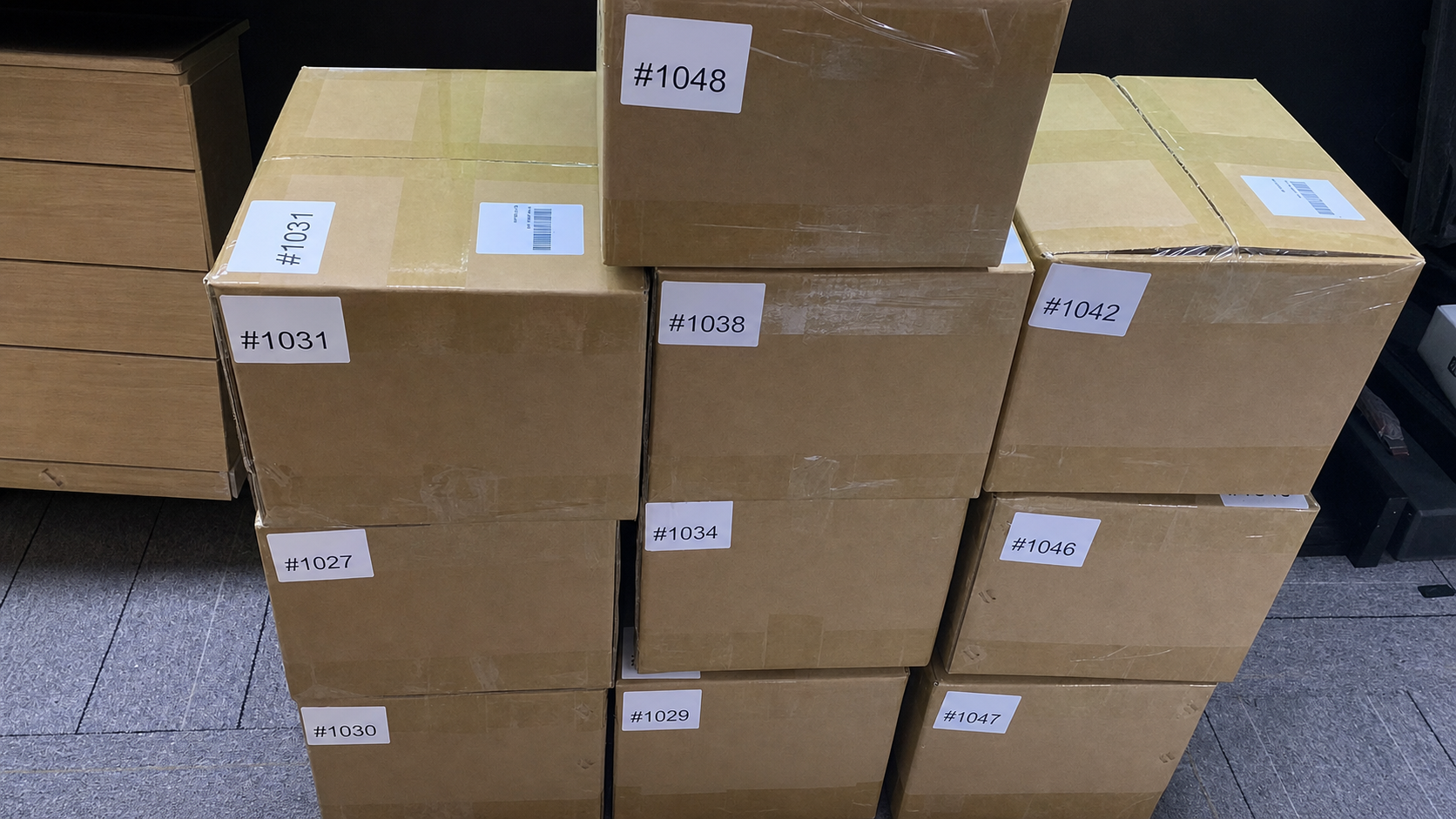 Numbered AntBelt G1 outbound cartons prepared for phased fulfillment